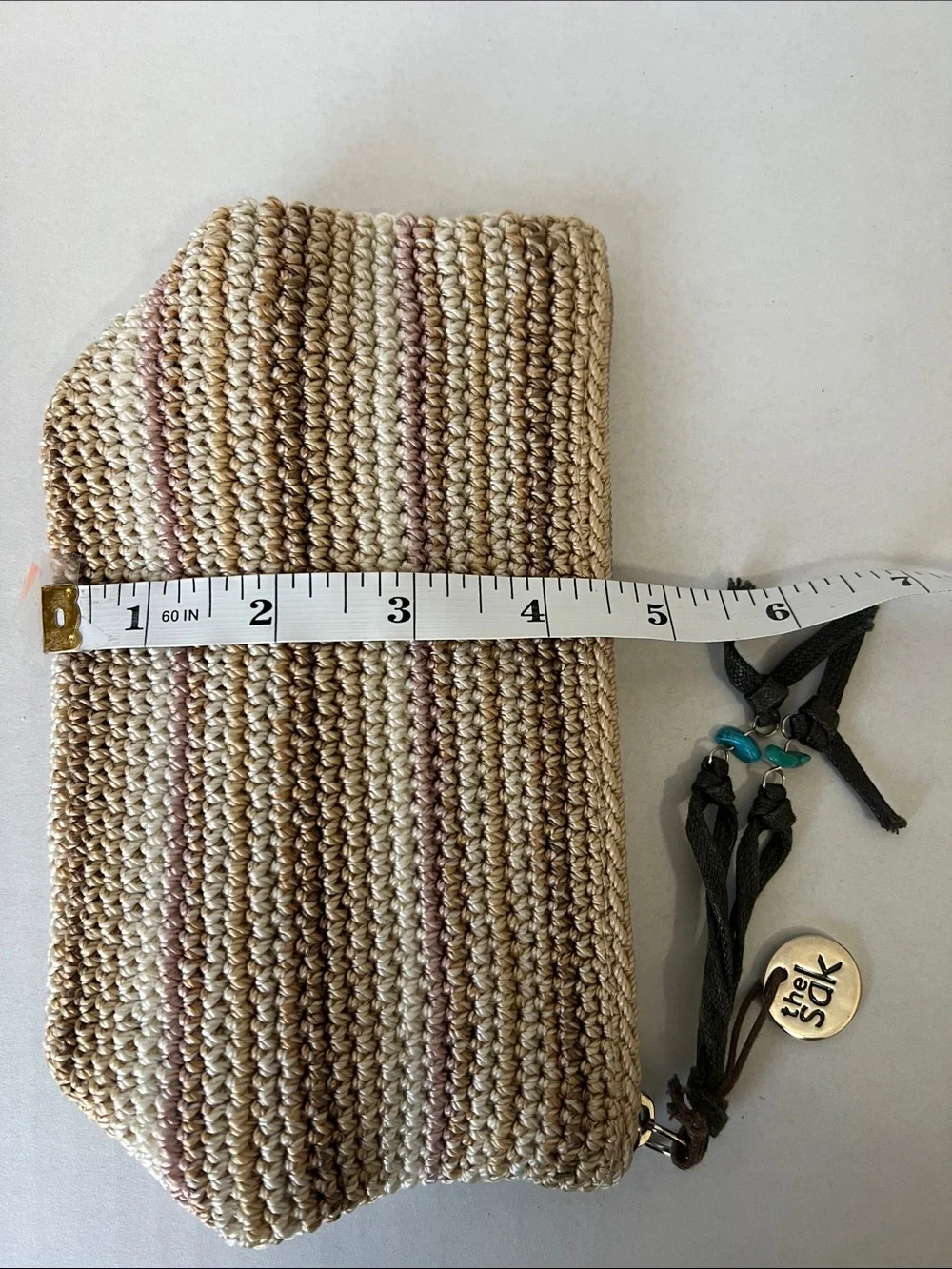 The Sak Beige and Cream Crocheted Cosmetic Pouch with Charm